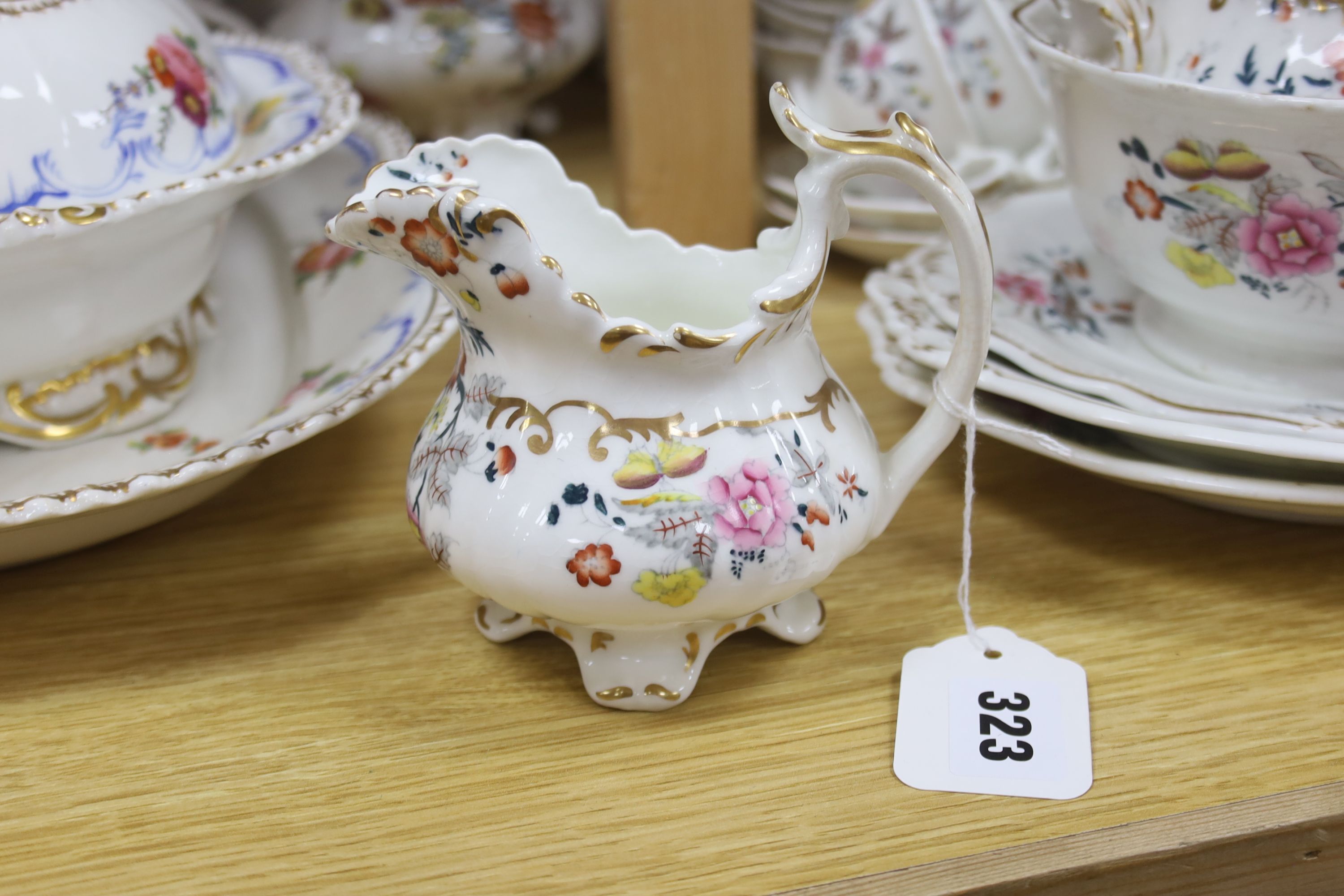 Two Victorian bone china part teasets, a covered tureen and matching meat plate